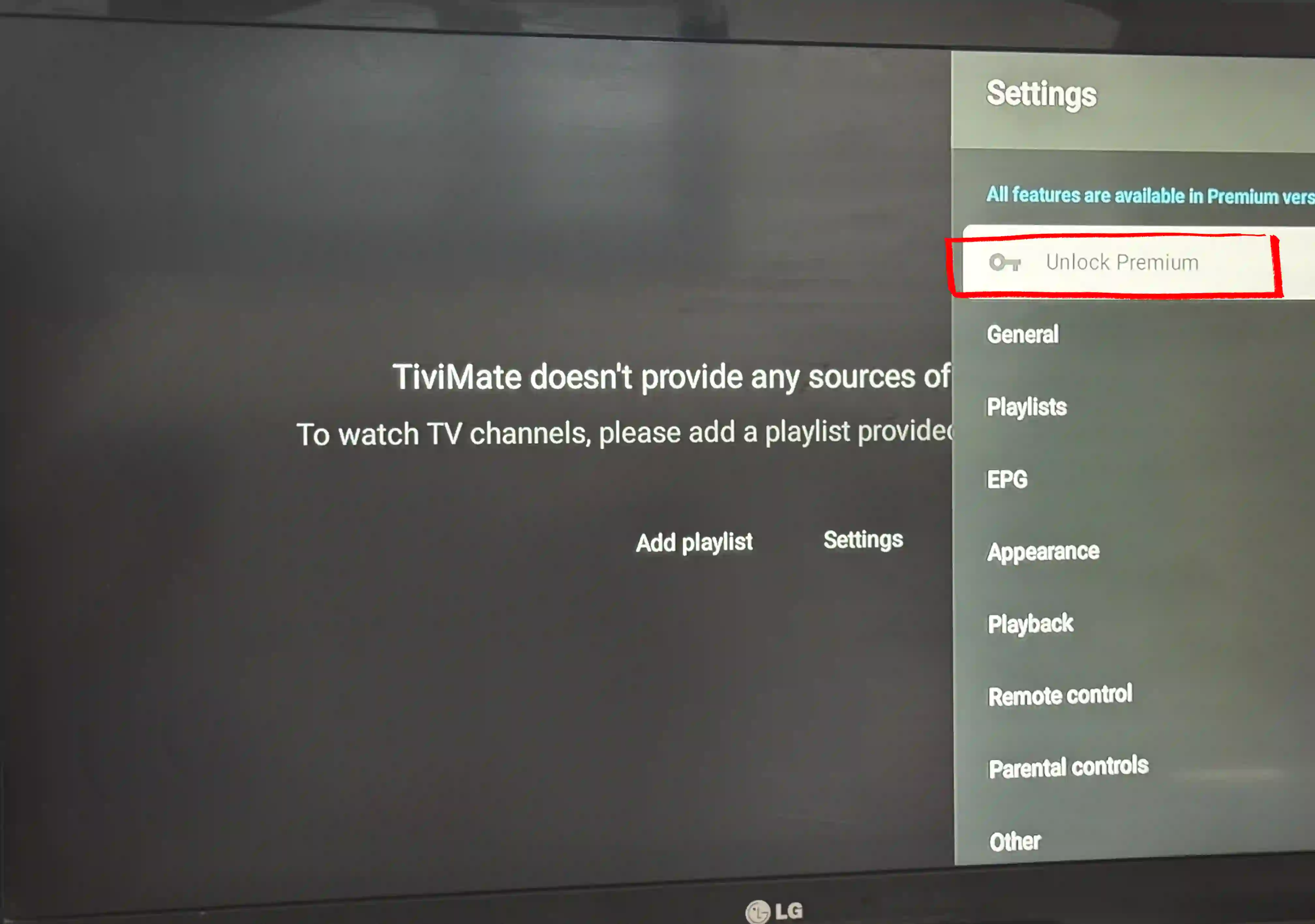 TiviMate settings menu on Android TV Box — Unlock Premium option at the top of the settings panel